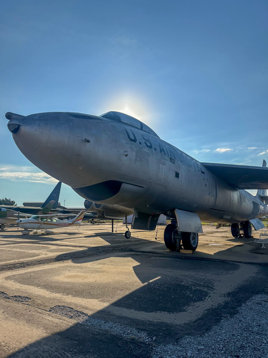 Front view of a large silver airplane with U.S. Air Force stenciled on the side
