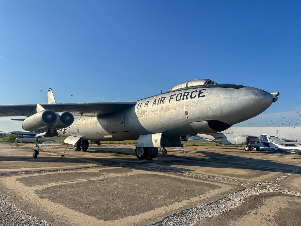 Side view of a large silver airplane with U.S. Air Force stenciled on the side