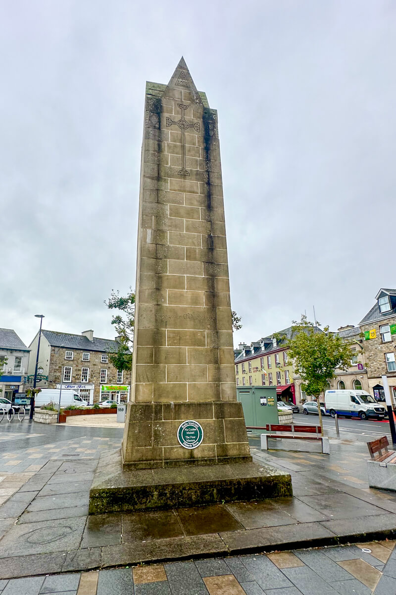 The stone monument in the center of the Diamond area in Donegal Town