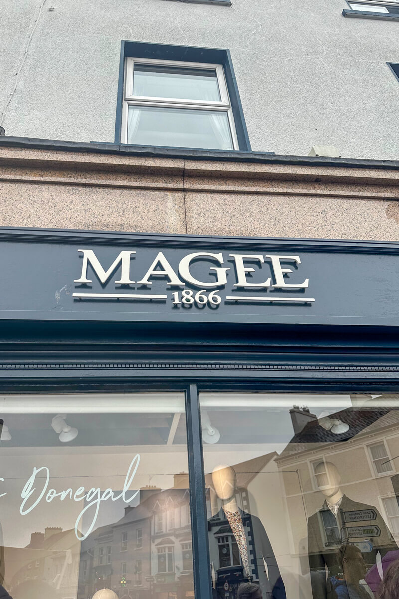 The navy storefront view of Magee