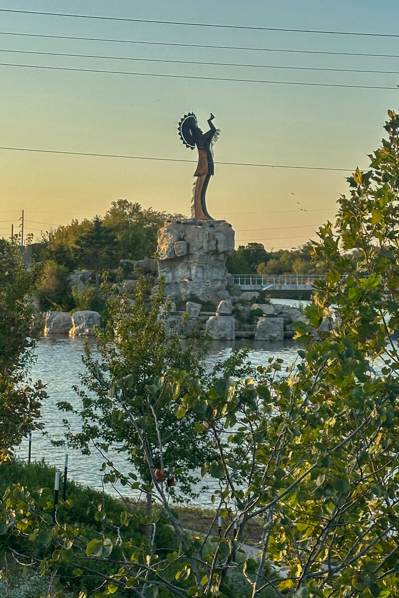 The Keeper of the Plains at twilight from a distance