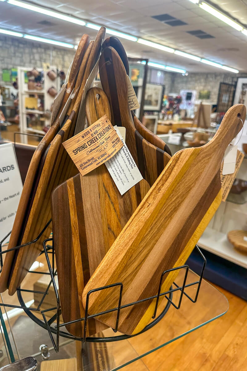 Wooden cutting boards on display in a store