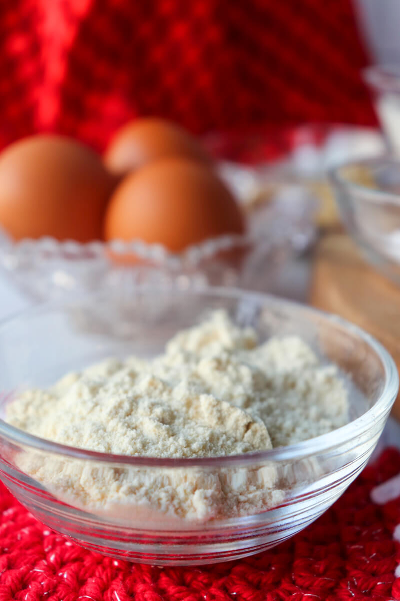 Glass bowls of almond flour, eggs, etc.