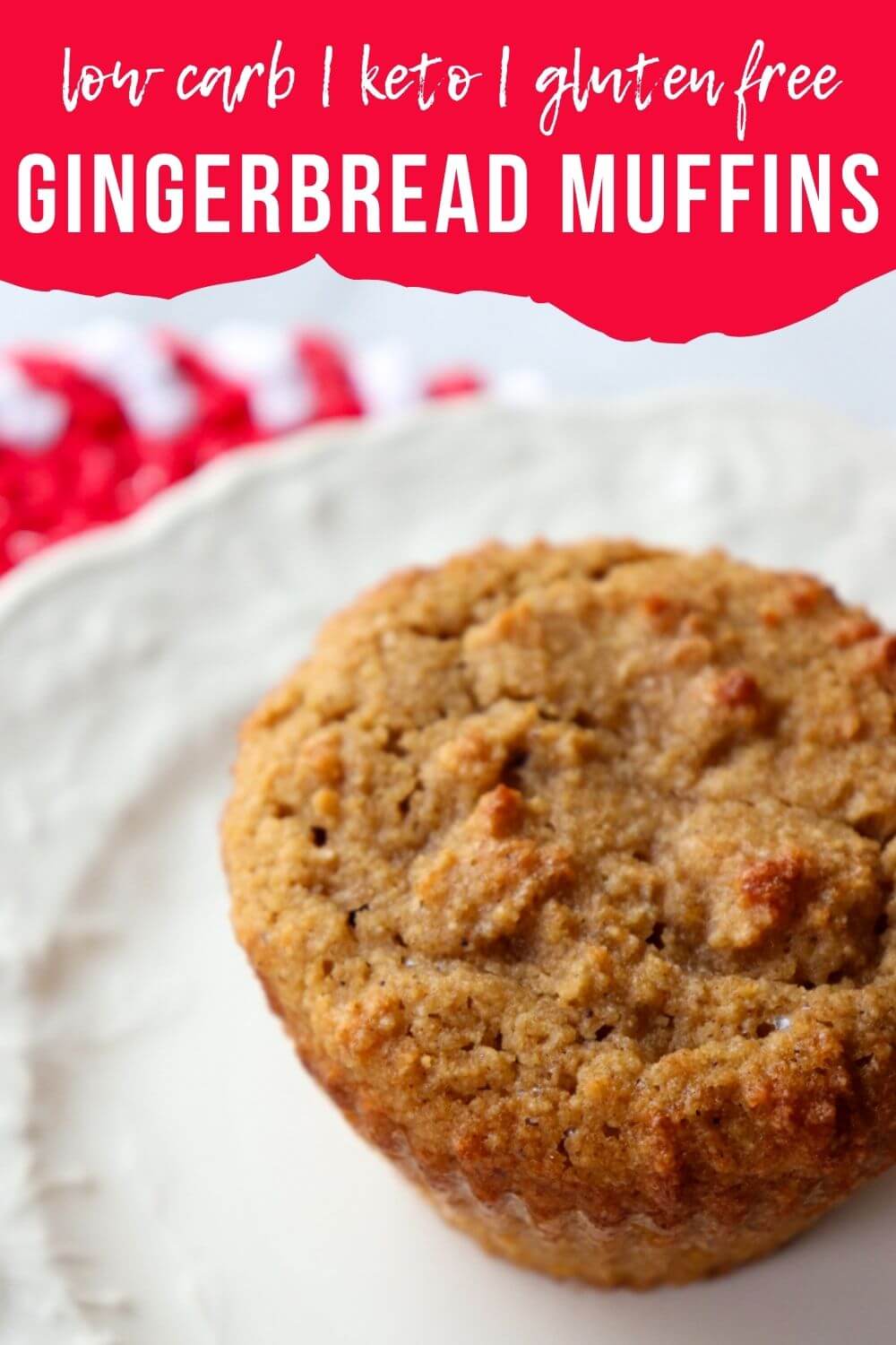 An overhead view of a low carb gingerbread muffin on a white plate with text overlay, "Low Carb, Keto, Gluten Free Gingerbread Muffins."