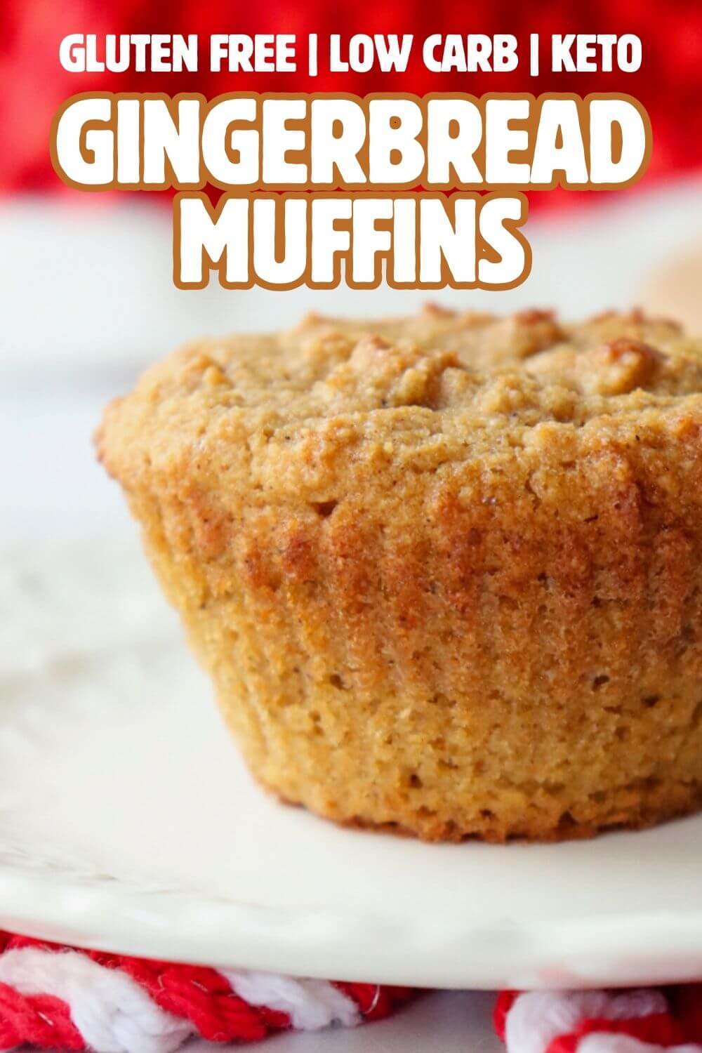 A front close up view of a low carb gingerbread muffin on a white plate with text overlay, "Gluten free, low carb, keto Gingerbread Muffins."