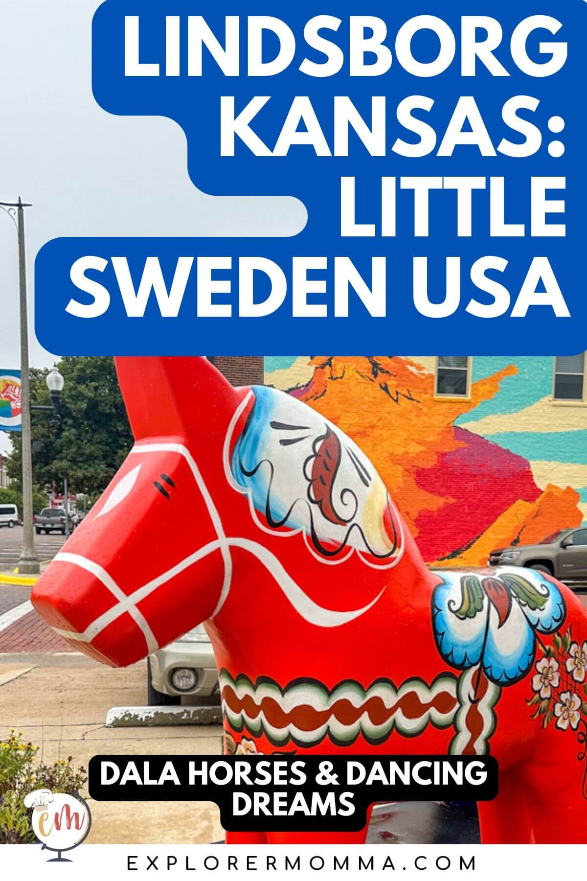 A classic red Dala Horse, pony sized, in front of a building with a Viking mural with text overlay, " Lindsborg Kansas: Little Sweden USA