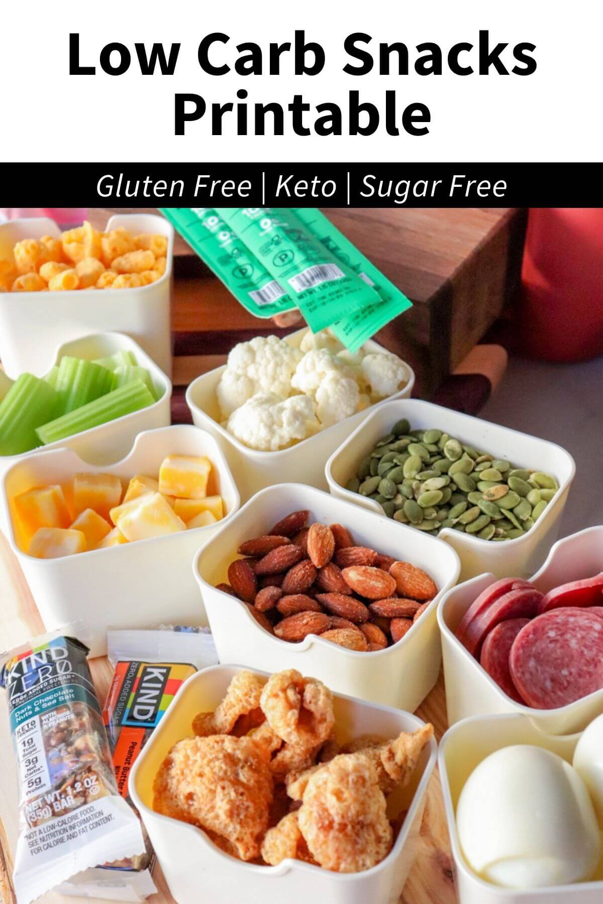 Low carb snacks printable graphic featuring keto-friendly foods including almonds, cheese cubes, celery, cauliflower, pumpkin seeds, pork rinds, salami, hard boiled eggs, and snack bars with text “Low Carb Snacks Printable – Gluten Free, Keto, Sugar Free”