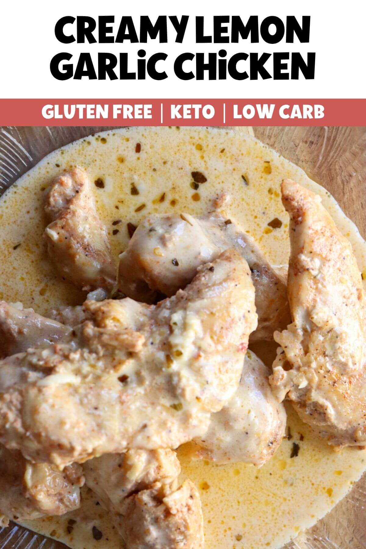 Overhead view of a textured glass plate of creamy lemon garlic chicken on a wooden board with text overlay "Gluten free, keto, low carb - Creamy Lemon Garlic Chicken."