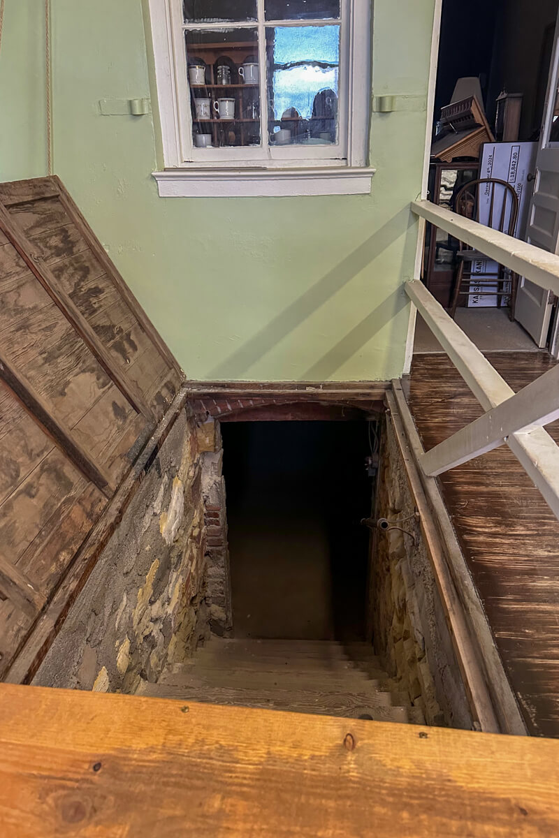 Door in the floor opened to reveal a staircase down into the under ground tunnels below Ellinwood, Kansas