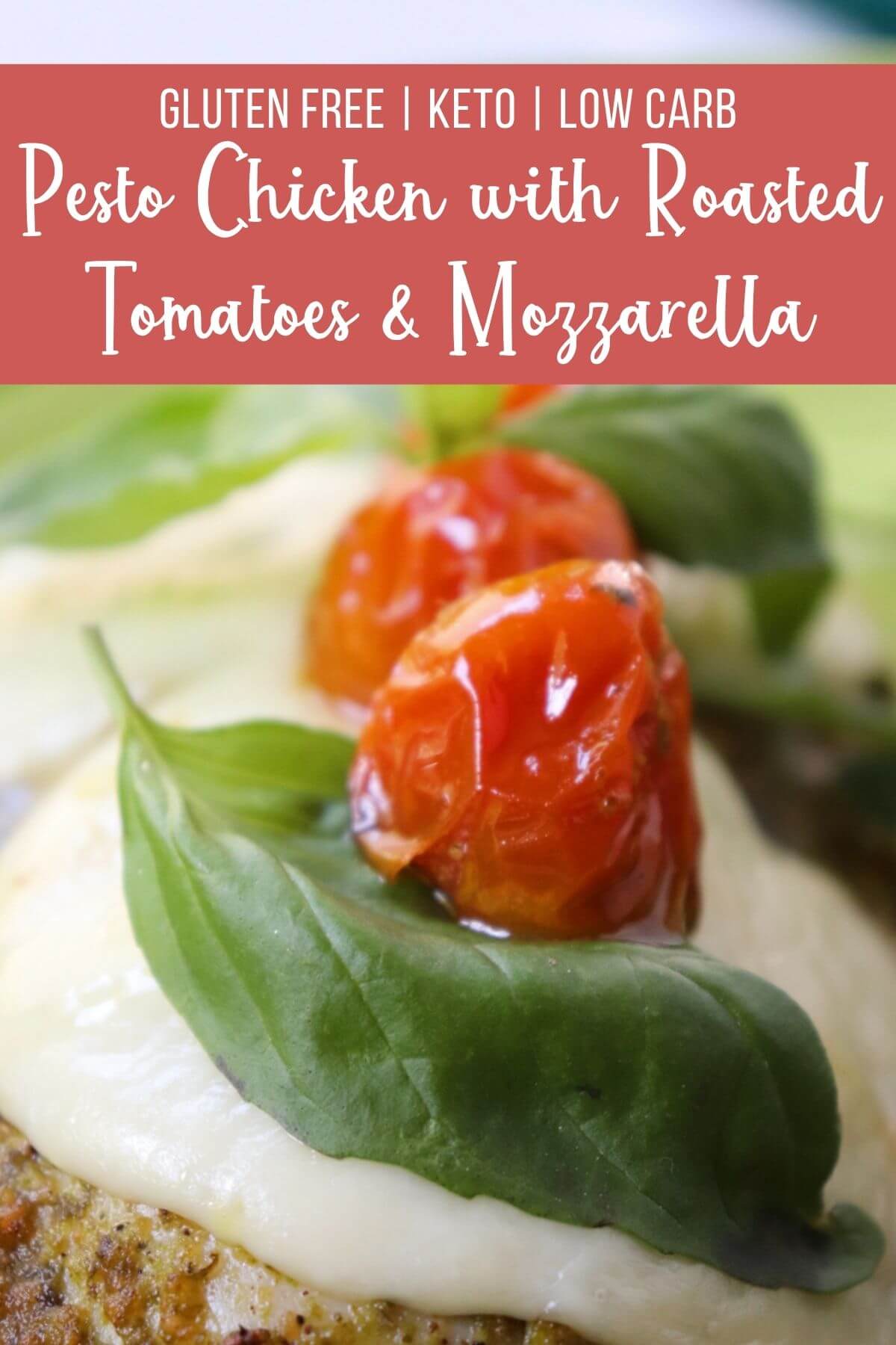 Close up of Pesto Chicken with Roasted Tomatoes & Mozzarella topped with a tomato and basil leaf